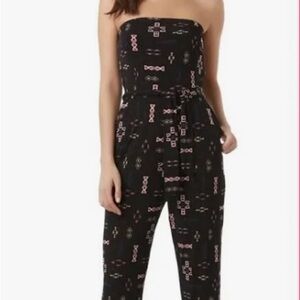 Stylish Black multicolor Strapless tribal-inspired jumpsuit.